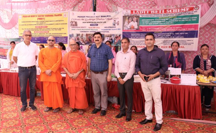 Participants engaging in health awareness camp at Poshan Project Kot Bhalwal