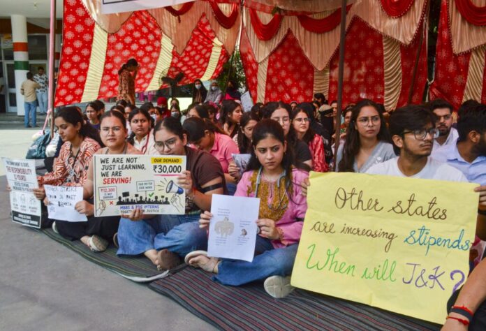 Medical interns protesting in Jammu and Kashmir demanding stipend hike